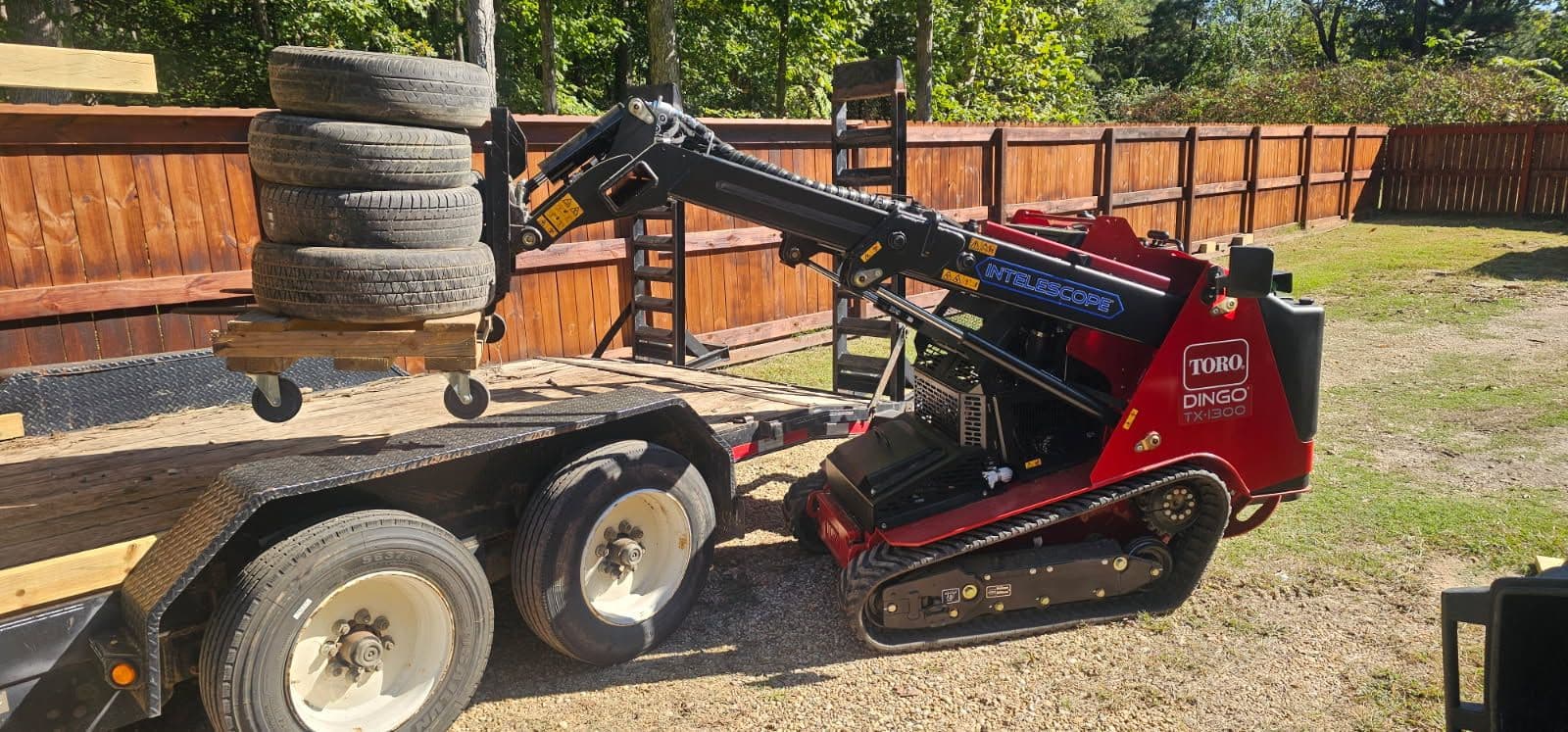 Efficient Tire Pickup with the Toro Dingo TX-1300 image