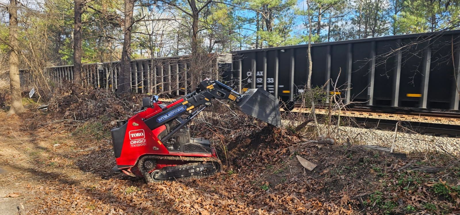 Efficient Debris Clearing with the Toro Dingo TX1300 image
